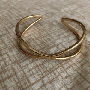 Gold criss cross bangle